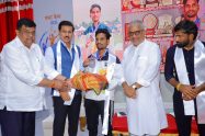 Rajasthan Sports Minister Col. Rajyavardhan Singh Rathore inspecting modern athletic facilities and instructing coaches during a surprise stadium review in Jaipur.