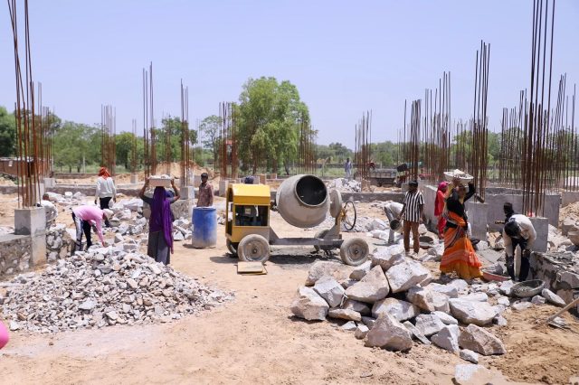 Cabinet Minister Col. Rajyavardhan Singh Rathore conducting an on-site progress inspection of the upcoming 100-bed Jhotwara Satellite Hospital building.