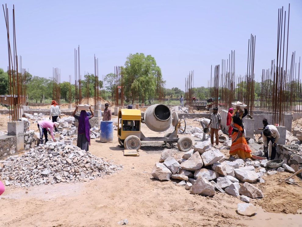 Cabinet Minister Col. Rajyavardhan Singh Rathore conducting an on-site progress inspection of the upcoming 100-bed Jhotwara Satellite Hospital building.