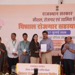 Col. Rajyavardhan Rathore interacting with youth during a job assistance camp focused on employment opportunities and skill development in Rajasthan